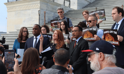 An image of Reps. Stansbury, Jackson, and Mfume, in addition to protesters, on the steps of the United States Capitol.